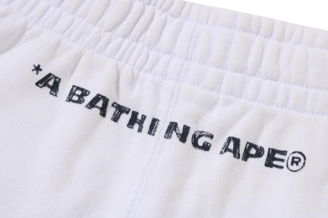 BAPE HEAVY WASH HAND DRAW FOOTBALL LOGO RELAXED FIT SWEAT SHORTS M WHITE