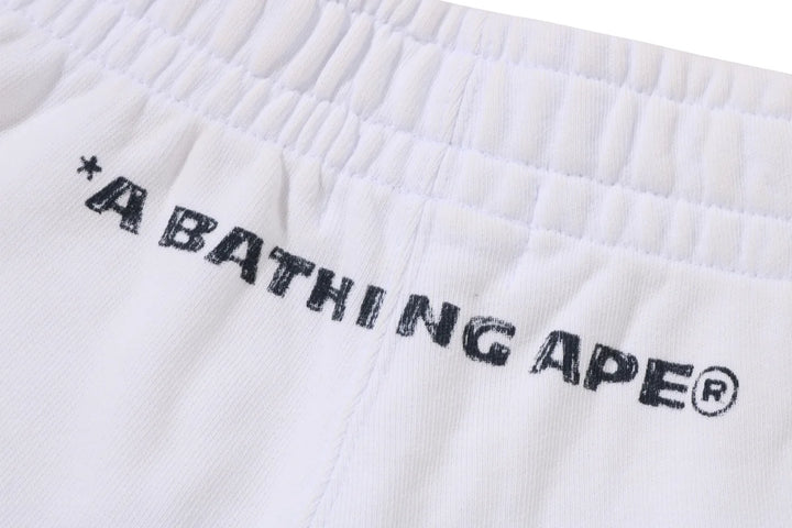 BAPE HEAVY WASH HAND DRAW FOOTBALL LOGO RELAXED FIT SWEAT SHORTS M WHITE
